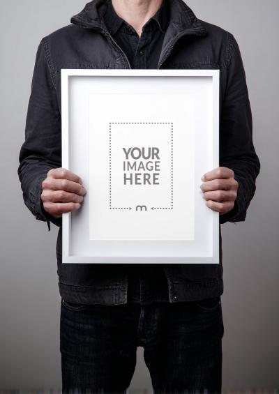 Frame Mockup Held by Creative Director for Visual Portfolio Showcase