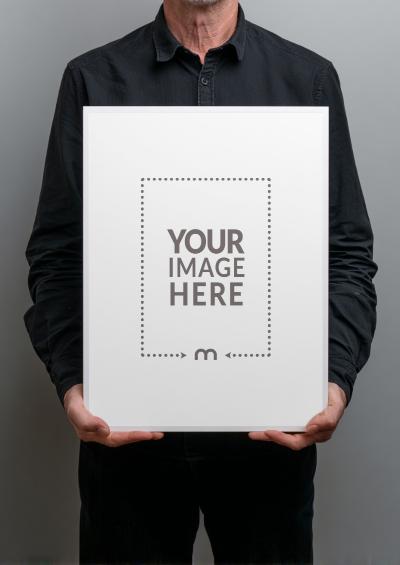 Frame Held by Designer for Branding Presentation