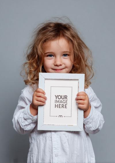 Picture Frame Held by Child for Family Photography