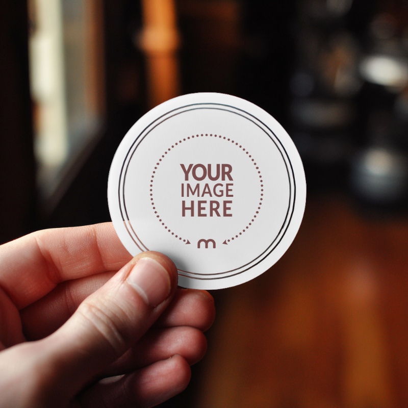 Circular Vinyl Sticker Mockup for Minimalist Logo Presentation preview image