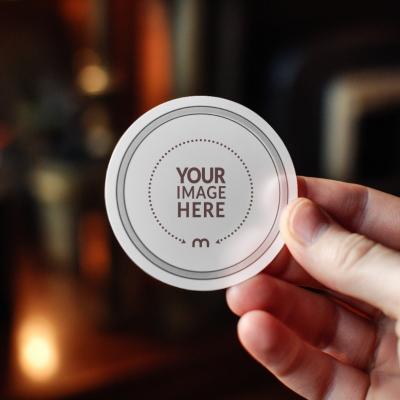 Round Vinyl Sticker Mockup in Hand for Sticker Design