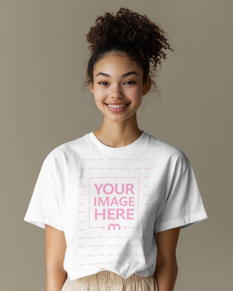 Loose T-Shirt Mockup on Cheerful Woman on Plain Background preview image