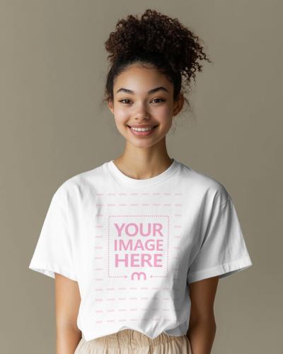 Loose T-Shirt Mockup on Cheerful Woman on Plain Background