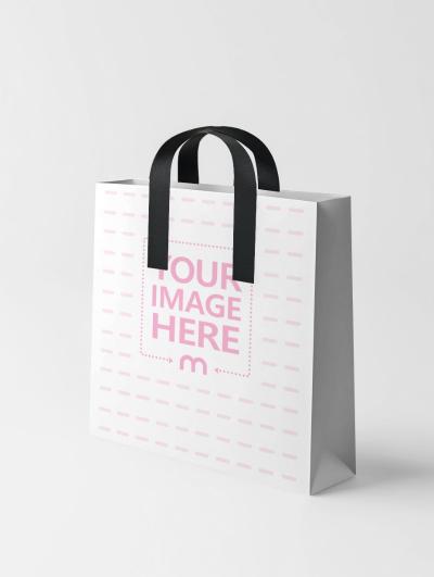 Gift Bag Mockup with Black Handles for Luxury Retail Branding
