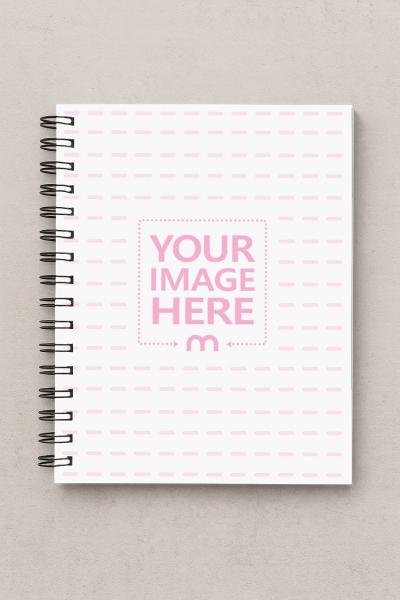 Top View Grid Notebook Mockup on Textured Surface for Stationery Design