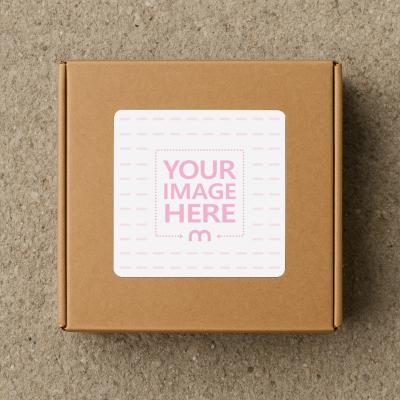 Mail Sticker Mockup on Cardboard Box Over Textured Surface