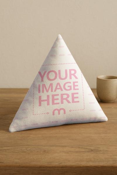 Triangle Sofa Pillow Mockup on Wooden Table with Coffee Cup