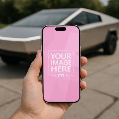 Hand Holding iPhone with Cybertruck Background PSD