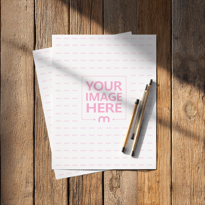 A4 Paper Mockup Top View on Wooden Background preview image