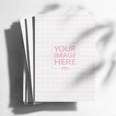 Stack of A4 Paper Mockup Top View on White Background