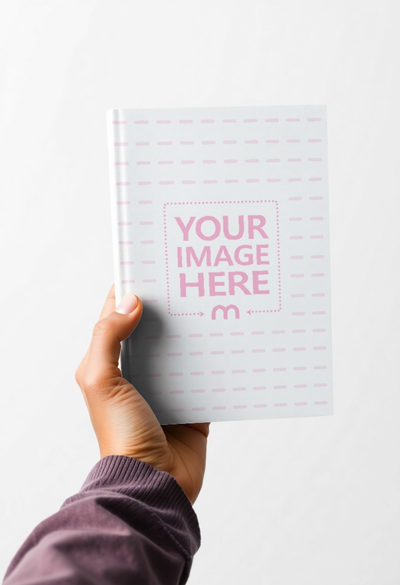 Book Mockup Held by Woman's Hand on White Isolated Background preview image