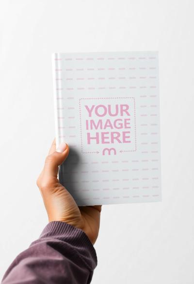 Book Mockup Held by Woman's Hand on White Isolated Background