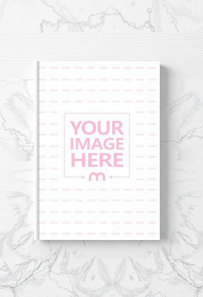 Top View Book Cover Mockup on Marble Background