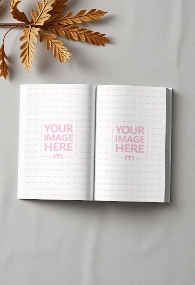 Open Book Page Mockup on Gray Background with Leaf Accent 