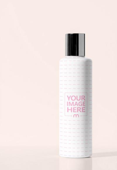 Bottle Mockup on Light Orange Background for Soft Clean Branding