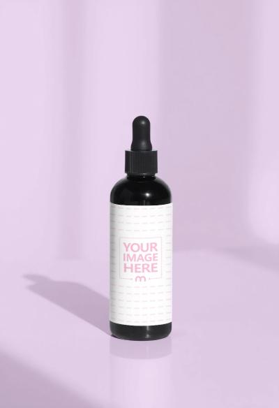 Bottle Label Mockup on Purple Background for Cosmetic Products