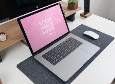 Laptop Mockup on Mouse Pad in Living Room for Website Display