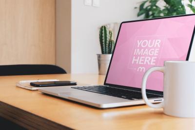 Laptop Mockup on Wooden Table in Living Room for Design Display
