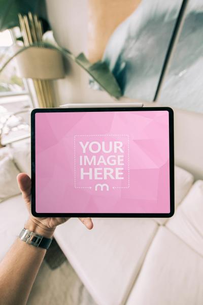 Tablet Mockup in Hand Outdoor for Lifestyle App Presentation