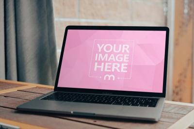 Laptop Mockup with Window Background on Wooden Table