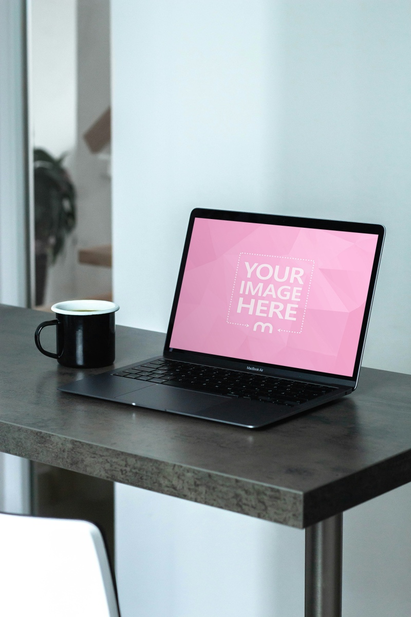Laptop Mockup with Coffee Cup on Table for Website Presentation preview image