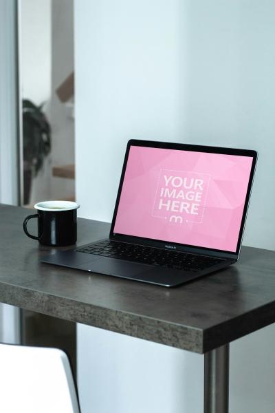 Laptop Mockup with Coffee Cup on Table for Website Presentation