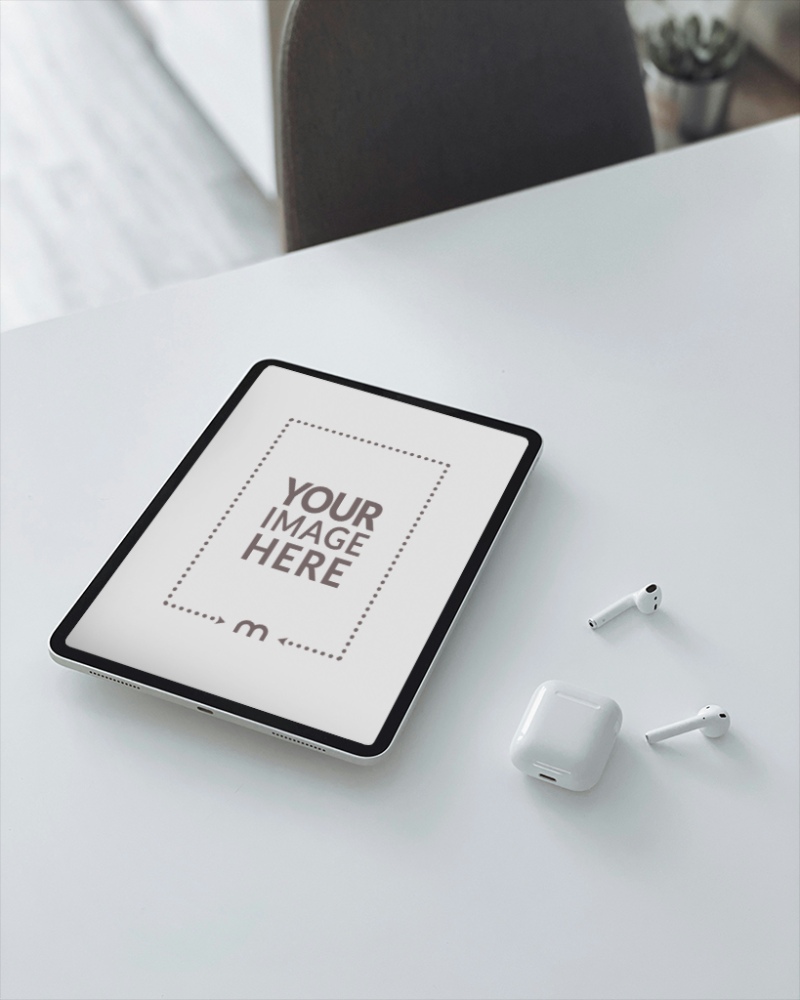 iPad Mockup on White Table with AirPods preview image
