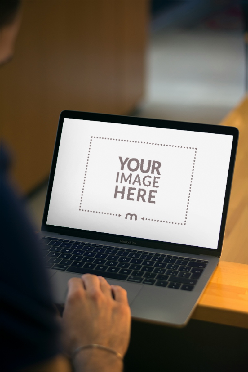 Laptop Screen Mockup with Person Working for Productivity Showcase preview image