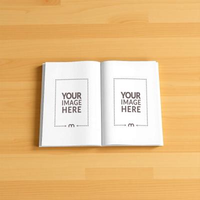 Top View Open Book Pages Mockup on Wooden Table