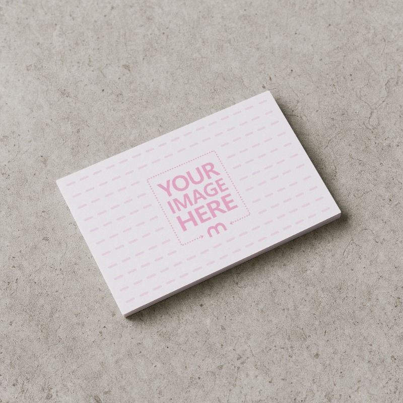 Business Card Mockup Stacked on Concrete Floor for Industrial Companies preview image