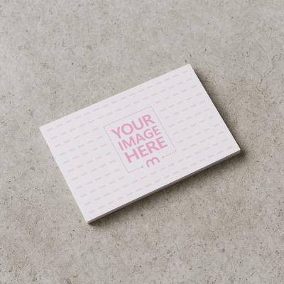 Business Card Mockup Stacked on Concrete Floor for Industrial Companies