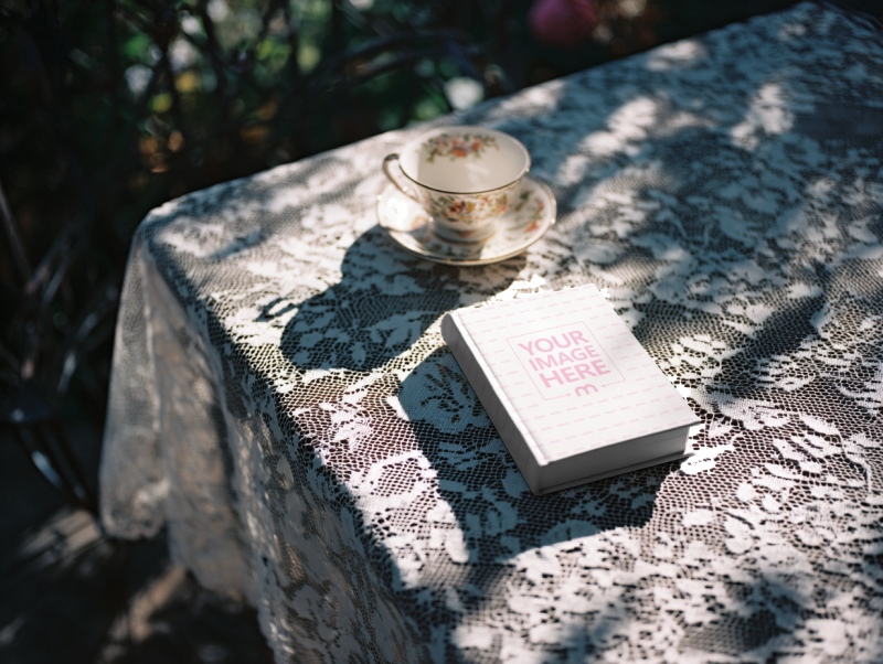 Book Cover Mockup on Knitted Tablecloth for Paperback Novels preview image
