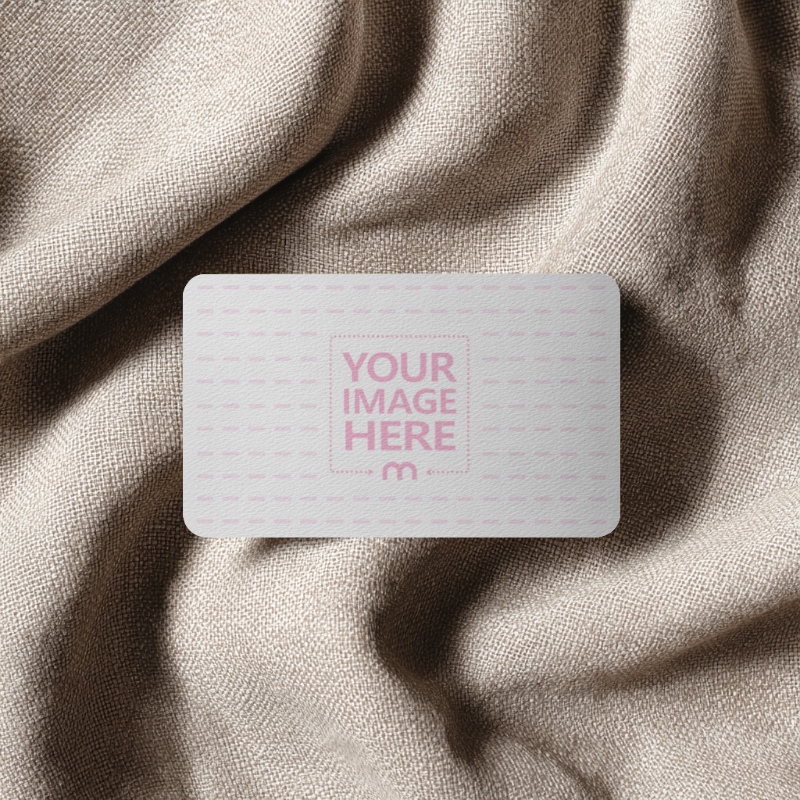 Rounded Business Card Mockup on Clothe Surface preview image