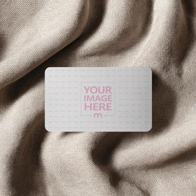 Rounded Business Card Mockup on Clothe Surface