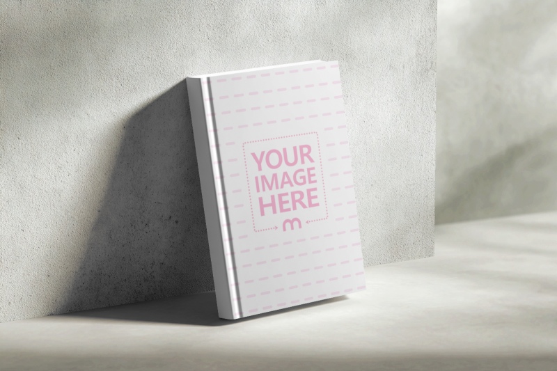 Book Cover Mockup in Concrete Room for Industrial Books preview image