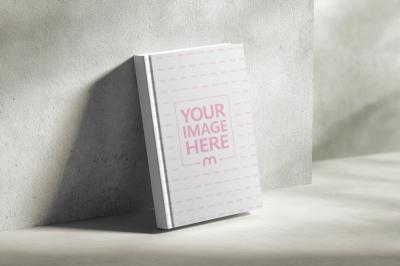 Book Cover Mockup in Concrete Room for Industrial Books