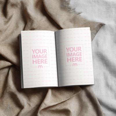 Open Book Page Mockup on Crumpled Cloth