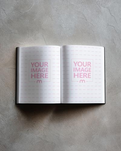 Open Book Page Mockup on Concrete Floor with Light