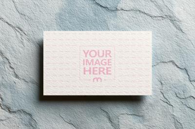 Business Card Mockup on Concrete Floor for Minimalist Branding