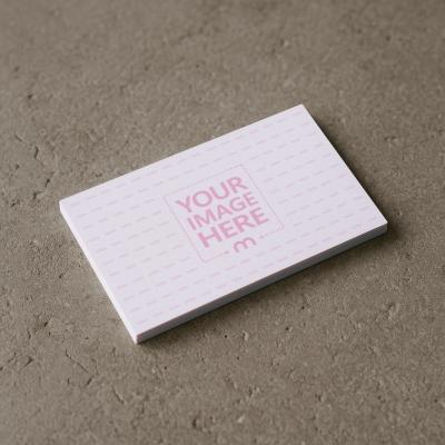 Business Card Mockup on Cement Floor for Minimalist Brand Identity