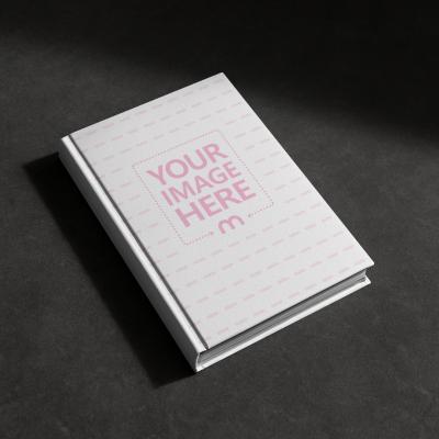 Book Cover Mockup on Dark Floor for Simple Book Cover Design