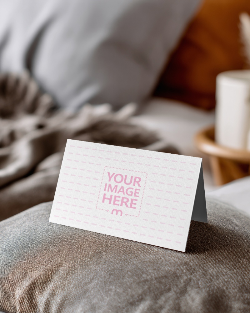 Business Card Mockup on Pillow in Living Room preview image