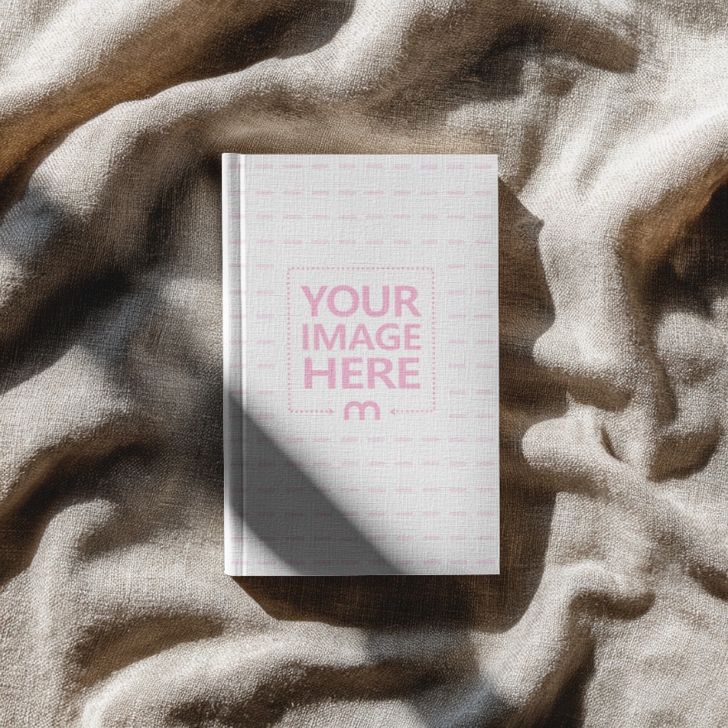 Book Cover Mockup on Brown Cloth for Top View preview image