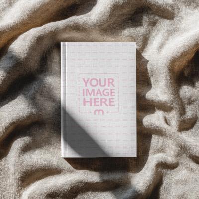 Book Cover Mockup on Brown Cloth for Top View