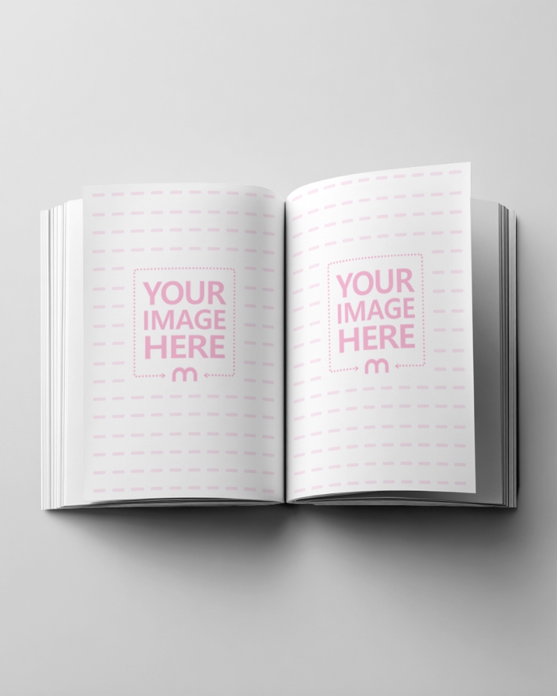 Top View of Open Book Page Mockup on White Background preview image