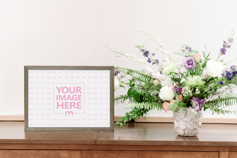 Landscape 7x5 Picture Frame Mockup with Flowers Landscape 7x5 Picture Frame Mockup with Flowers preview image