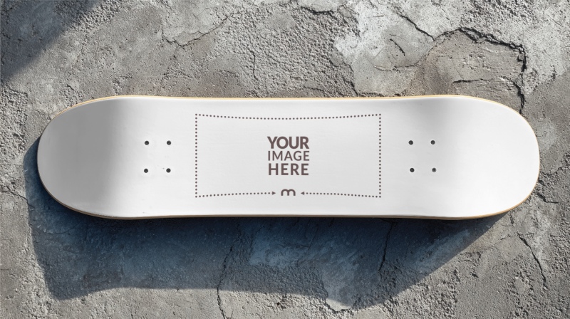 Skateboard Mockup on Concrete Floor for Sportswear Branding preview image