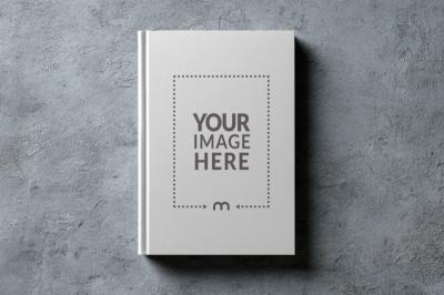 Top View Book Cover Mockup on Concrete Floor