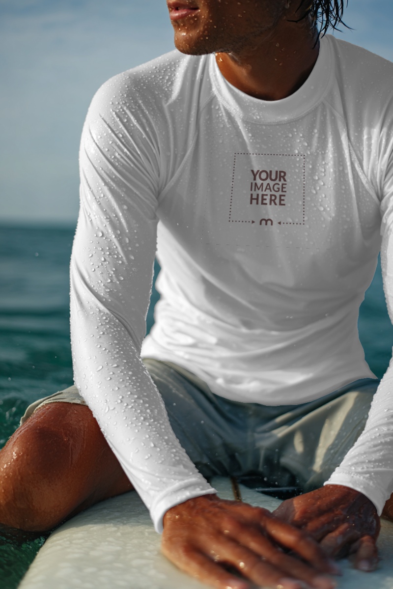 Surfer T-Shirt Mockup on Surfboard by the Ocean preview image