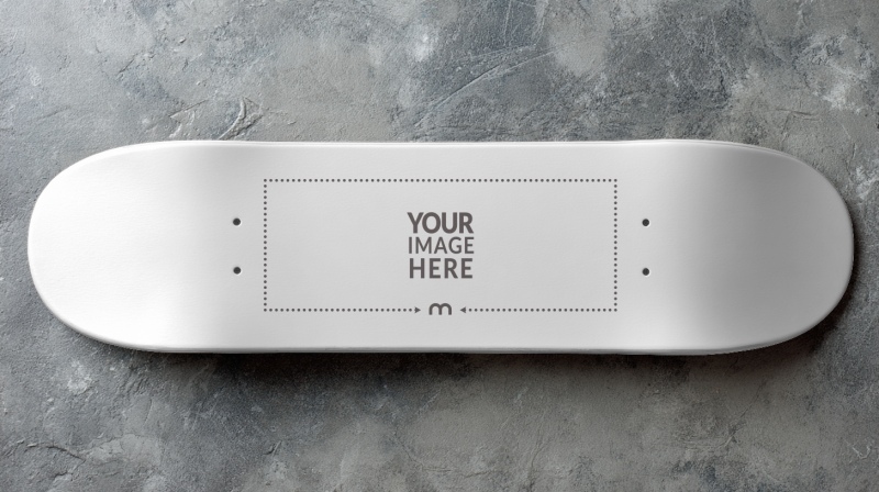 Skateboard Mockup on Concrete for Streetwear Designs preview image